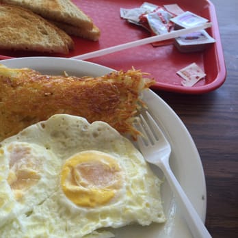 Brolly Hut - Eggs, hash browns and bacon. Sd toast. I will be eating this meal ALL day! - Burgers Near Me - Inglewood, California Brolly Hut - Eggs, hash browns and bacon. Sd toast. I will be eating this meal ALL day! - Burgers Near Me - Inglewood, California