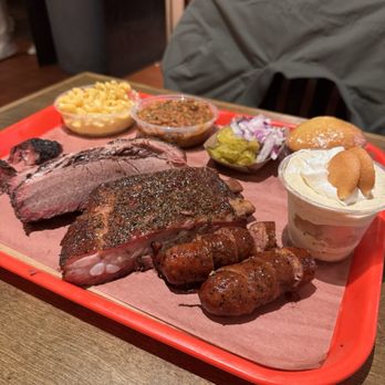 Terry Black's Barbecue - Brisket, pork rib. Jalapeño cheddar sausage, mac n cheese, beans, corn bread, banana pudding - Barbeque Near Me - Austin, Texas Terry Black's Barbecue - Brisket, pork rib. Jalapeño cheddar sausage, mac n cheese, beans, corn bread, banana pudding - Barbeque Near Me - Austin, Texas