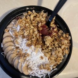 Frozen solid acai bowl minus the peanut butter and chocolate drizzle I paid extra for. Never again. Frozen solid acai bowl minus the peanut butter and chocolate drizzle I paid extra for. Never again.