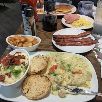 Another Broken Egg Cafe - Lobster Brie Omelette with a white wine butter sauce!!!! - Breakfast & Brunch Near Me - Columbia, South Carolina Another Broken Egg Cafe - Lobster Brie Omelette with a white wine butter sauce!!!! - Breakfast & Brunch Near Me - Columbia, South Carolina