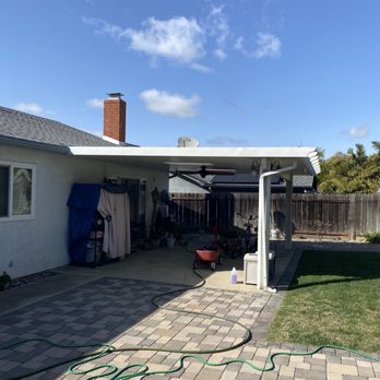 Patio Dynamics - Before: patio covering that was not built or installed properly and led to pooling and warping - Patio Coverings Near Me Patio Dynamics - Before: patio covering that was not built or installed properly and led to pooling and warping - Patio Coverings Near Me