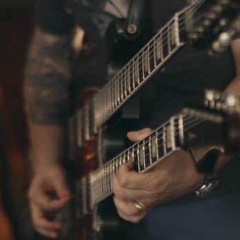 Filmhunter Media - A still from Terraneous Wrecks music promo, that includes an extremely rare guitar. - Video/Film Production Near Me Filmhunter Media - A still from Terraneous Wrecks music promo, that includes an extremely rare guitar. - Video/Film Production Near Me