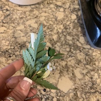 Schramm's Flowers & Gifts - I was surprised at how small this boutonniere is. There isn't a bow or anything. It is extremely plain. - Florists Near Me - Toledo, Ohio