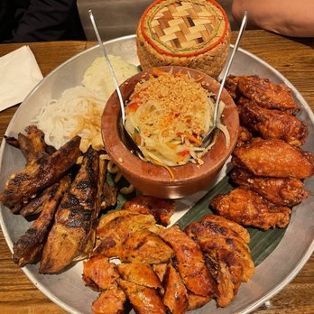Bhan Mae Vane - BMV Ultimate Papaya Platter - Angel wings, Lao sausage, pork ribs & Thai style papaya salad - Thai Near Me - Alameda, California Bhan Mae Vane - BMV Ultimate Papaya Platter - Angel wings, Lao sausage, pork ribs & Thai style papaya salad - Thai Near Me - Alameda, California