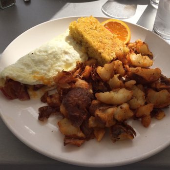 Four Friends Kitchen - American Omelet (bacon, ham, 4cheese blend) with egg whites with BBQ potatoes and cornbread - Southern Near Me - Denver, Colorado Four Friends Kitchen - American Omelet (bacon, ham, 4cheese blend) with egg whites with BBQ potatoes and cornbread - Southern Near Me - Denver, Colorado
