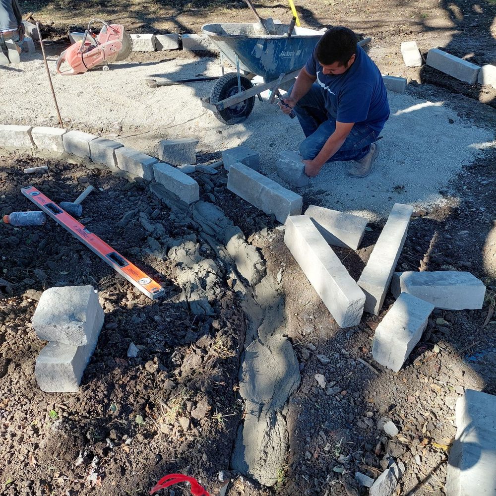 GroundScape Solutions - Placing the stone border - Landscaping Near Me - Haltom City, Texas GroundScape Solutions - Placing the stone border - Landscaping Near Me - Haltom City, Texas