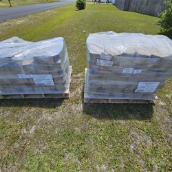 Lti Trucking Services - Heavy stone blocks for retaining  wall.
