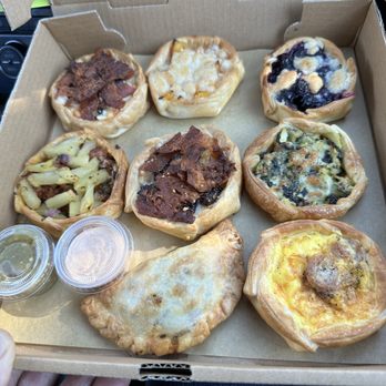 Vinoma - Top: bacon/plum; peach; blueberry Middle: Al Pastor; bacon/plum; spinach/artichoke Bottom: Traditional beef; Sausage, egg, cheese - Empanadas Near Me - Rohnert Park, California
