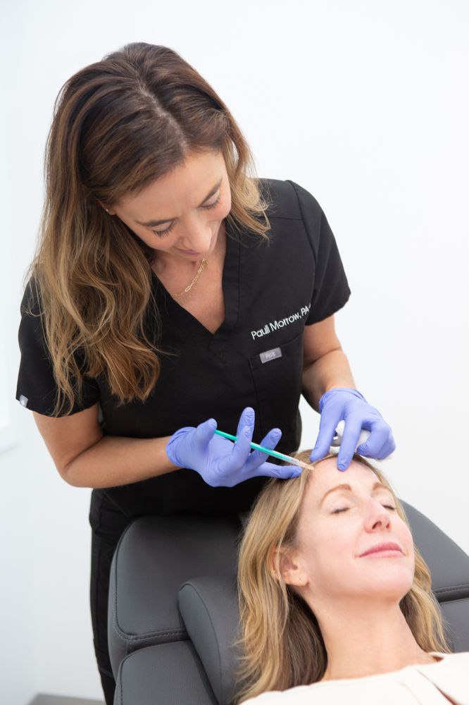 Evolution Dermatology + Wellness Logo
