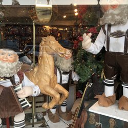 Main Street Designs - Cutely decorated shop window decked out for the holidays.