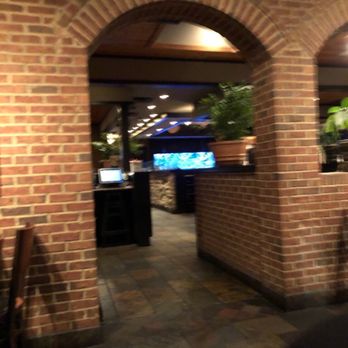 Cheddar's Scratch Kitchen - Archway to main restaurant from back/side room - American Near Me - Triadelphia, West Virginia