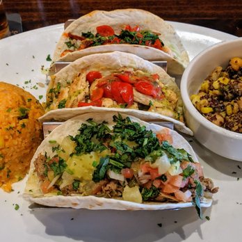 Maggie McFly's | Manchester - 3 Street Tacos with a side of yellow rice and Chick Pea Quinoa corn salad. - Breakfast & Brunch Near Me - Manchester, Connecticut Maggie McFly's | Manchester - 3 Street Tacos with a side of yellow rice and Chick Pea Quinoa corn salad. - Breakfast & Brunch Near Me - Manchester, Connecticut
