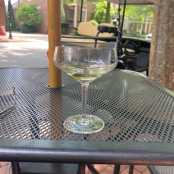 Commonwealth Tap - a glass of wine on a table - Wine Bars Near Me - Prospect, Kentucky