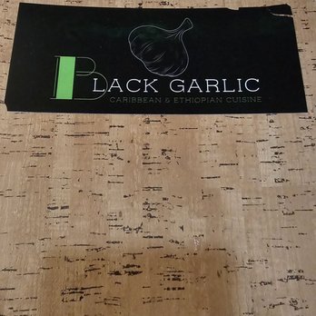 Black Garlic - Menu - Caribbean Near Me - Kansas City, Missouri Black Garlic - Menu - Caribbean Near Me - Kansas City, Missouri