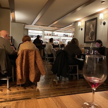 Brava - a group of people sitting at a restaurant - Bars Near Me - Lenox, Massachusetts
