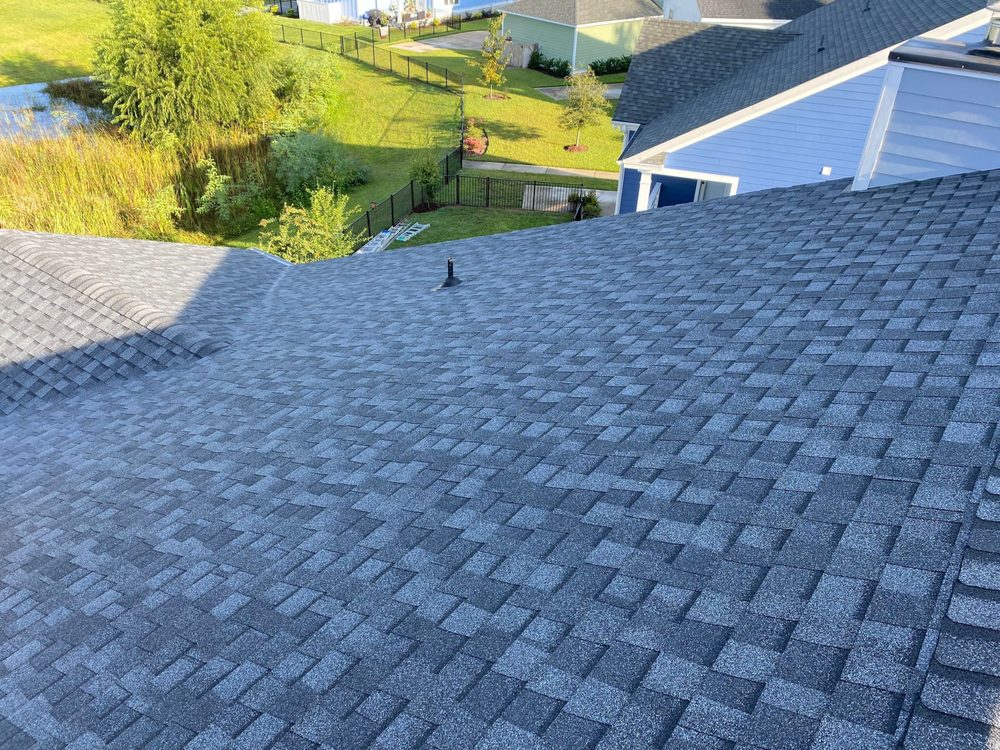 Slide of Precision Roofing