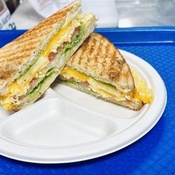 Nirvana Latte - This is our fiesta panini, Cheddar and mozzarella cheese with lettuce tomato eggs and avocado spread! Absolutely delicious!