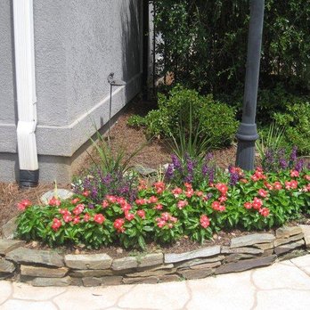 Passiflora Landscape & Design - a flower bed in front of a house - Landscape Architects or Designers Near Me - Mount Pleasant, South Carolina Passiflora Landscape & Design - a flower bed in front of a house - Landscape Architects or Designers Near Me - Mount Pleasant, South Carolina