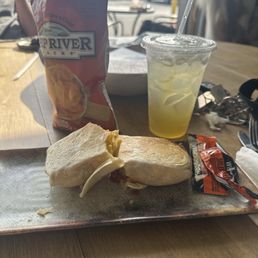 Sausage burrito, Golden hour lemonade, and chips Sausage burrito, Golden hour lemonade, and chips
