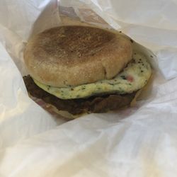 Turkey sausage and veggie egg white breakfast sandwich on an English muffin