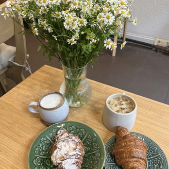 Le Phin - Sesame latte & almond croissant (left)  Pandan latte & regular croissant (right) - Coffee & Tea Near Me - New York, New York