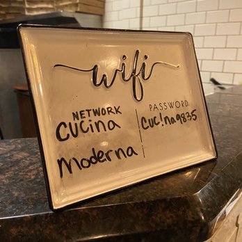 Cucina Moderna - a sign on a counter - Italian Near Me - Lake Worth, Florida Cucina Moderna - a sign on a counter - Italian Near Me - Lake Worth, Florida
