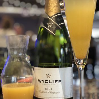 The Lola - I don't drink, but it was my friends birthday and she wanted peach purée for her bottomless mimosas and the team made it happen! - Cocktail Bars Near Me - Glendale, Arizona The Lola - I don't drink, but it was my friends birthday and she wanted peach purée for her bottomless mimosas and the team made it happen! - Cocktail Bars Near Me - Glendale, Arizona