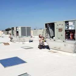 Comfort Solutions Heating & Cooling - When a commercial rooftop unit needs attention, opening the equipment allows a technician to inspect its internal components ...