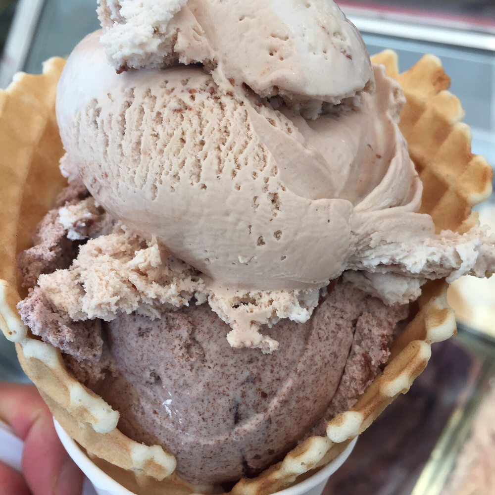 MooTime Creamery - Two scoops on a waffle cone. Nutella banana and stracciatella ice cream - Ice Cream & Frozen Yogurt Near Me - Coronado, California MooTime Creamery - Two scoops on a waffle cone. Nutella banana and stracciatella ice cream - Ice Cream & Frozen Yogurt Near Me - Coronado, California