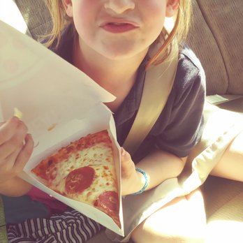 7-Eleven - a little girl in sunglasses eating a slice of pizza - Convenience Stores Near Me - San Bernardino, California 7-Eleven - a little girl in sunglasses eating a slice of pizza - Convenience Stores Near Me - San Bernardino, California