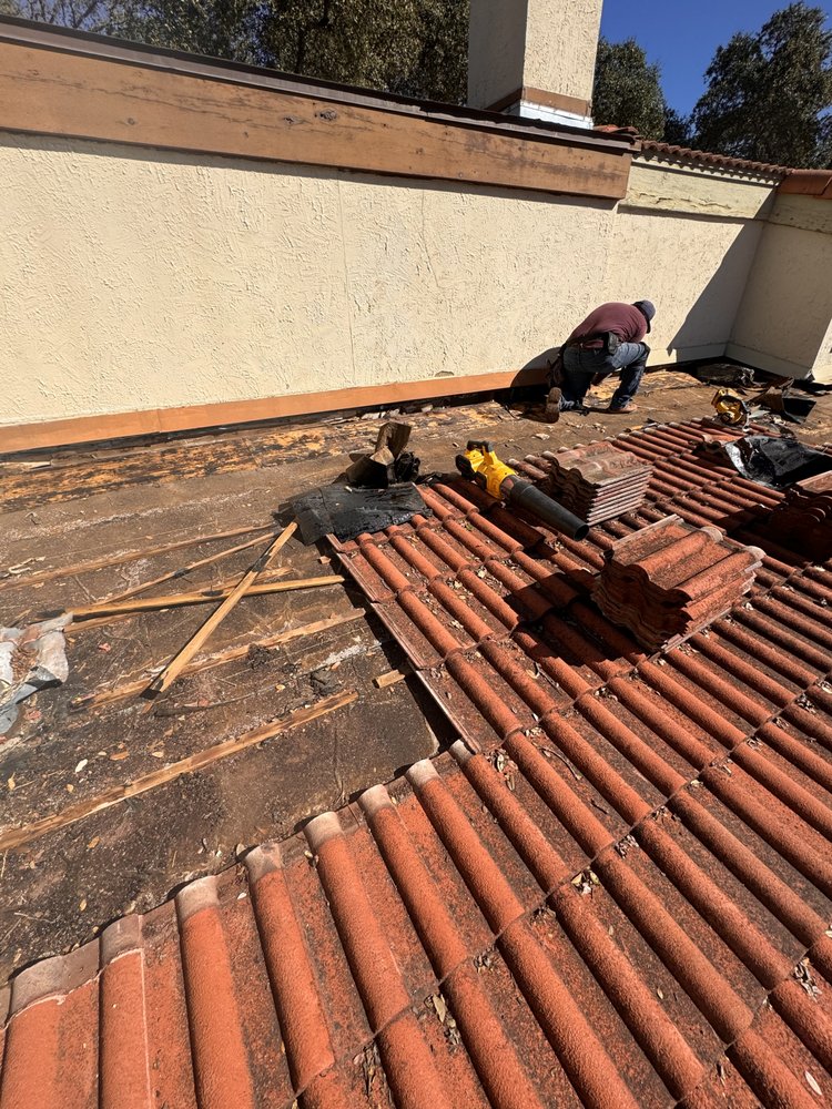 Slide of Magnum Roofing & Restoration