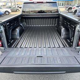Rhino Liner bed coating.  Black with UV top coat