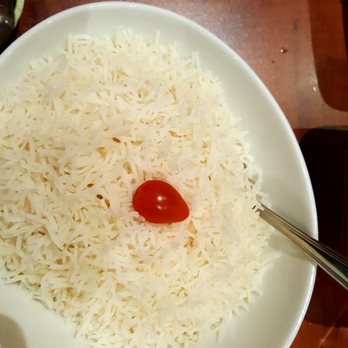 An Indian Affair - Basmatt rice... And yes that is a strawberry on top! Went perfectly with the Curry Mango Chicken - Indian Near Me - Langley, British Columbia