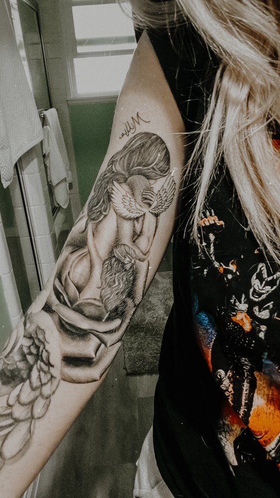 Tattoos by Dorian Logo