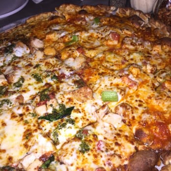 The Airliner - Half buffalo chicken and half chicken pesto. Both are AMAZE BALLS. - Pizza Near Me - Iowa City, Iowa