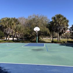 Emerald Estates Park - Half basketball court that doubles as pickleball court with movable net.
