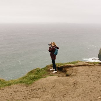 Cliffs of Moher - Don't be like her. That photo close to the edge isn't worth it. - Local Flavor Near Me - Liscannor, CE Cliffs of Moher - Don't be like her. That photo close to the edge isn't worth it. - Local Flavor Near Me - Liscannor, CE