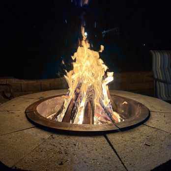 Clark's Firewood - Fire wood in a fire pit - Firewood Near Me
