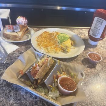 Earl's Castle - Asada hard shell taco omelette and a side of avacado - American Near Me - Bullhead City, Arizona Earl's Castle - Asada hard shell taco omelette and a side of avacado - American Near Me - Bullhead City, Arizona