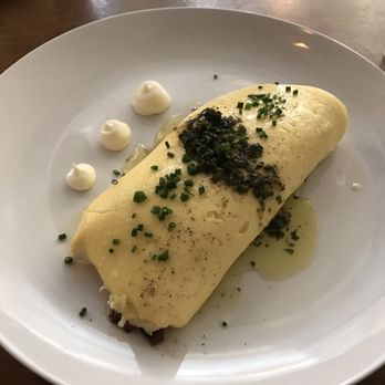 Tilia - Omelette of the week. Contents: cheese, beef, super yummy ! - New American Near Me - Minneapolis, Minnesota Tilia - Omelette of the week. Contents: cheese, beef, super yummy ! - New American Near Me - Minneapolis, Minnesota