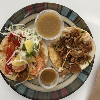 El Nahual Tacos - Tacos plated (at home) - Black Tiger Shrimp and Al Pastor taco (the pineapple is supposed to be on the Al Pastor oops) - Mexican Near Me - Toronto, Ontario El Nahual Tacos - Tacos plated (at home) - Black Tiger Shrimp and Al Pastor taco (the pineapple is supposed to be on the Al Pastor oops) - Mexican Near Me - Toronto, Ontario
