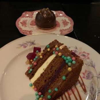 Bistro Vendôme - Desserts. Chocolate and Peanut butter bomb and gingerbread cake. - French Near Me - Denver, Colorado