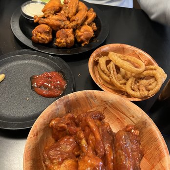 Duff's Famous Wings - a plate of chicken wings and fries - American Near Me - Amherst, New York