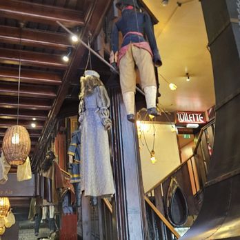 Le Roy d'Espagne - Dolls hanging from the rafters! - Belgian Near Me - Brussels, BRU Le Roy d'Espagne - Dolls hanging from the rafters! - Belgian Near Me - Brussels, BRU
