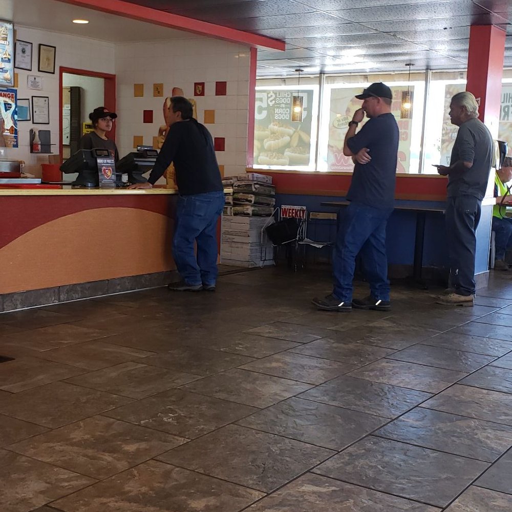 Finally taking our order after a line formed behind us. Finally taking our order after a line formed behind us.