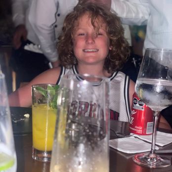Harry's - Me and Hugo behind me also drinks were so tasty. - Steakhouses Near Me - Cancún, ROO