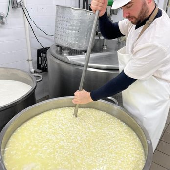 Jersey Girl Cheese - a man mixing cheese into a large pot - Cheese Shops Near Me - Rockaway, New Jersey Jersey Girl Cheese - a man mixing cheese into a large pot - Cheese Shops Near Me - Rockaway, New Jersey