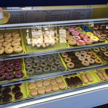 Daylight Donuts - a variety of doughnuts in a display case - Donuts Near Me - Warner Robins, Georgia