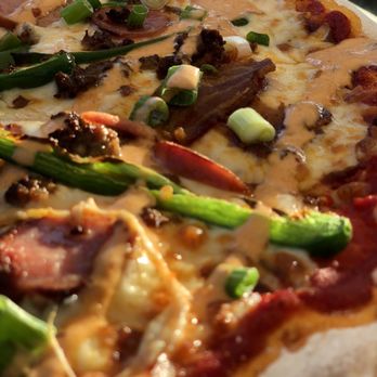 Verde Bistro - El Paso spicy- 4 meat pizza - Tapas Bars Near Me - Bulverde, Texas Verde Bistro - El Paso spicy- 4 meat pizza - Tapas Bars Near Me - Bulverde, Texas