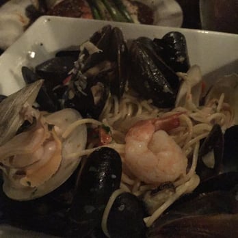 Tula Kitchen - Seafood Rigoti - shrimp, little neck clams and mussels in a garlic parmesan wine sauce with an option of gluten free pasta - Vegan Near Me - Bay Shore, New York Tula Kitchen - Seafood Rigoti - shrimp, little neck clams and mussels in a garlic parmesan wine sauce with an option of gluten free pasta - Vegan Near Me - Bay Shore, New York